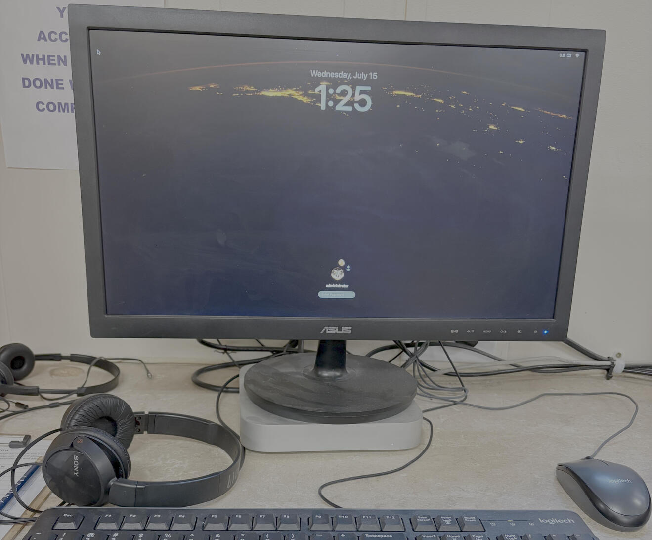 Image of Mac Mini and a monitor.